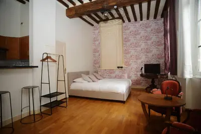 Un ou plusieurs lits dans un hébergement de l'établissement La Chambre d'Emma