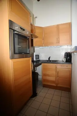 Cuisine ou kitchenette dans l'établissement La Chambre d'Emma
