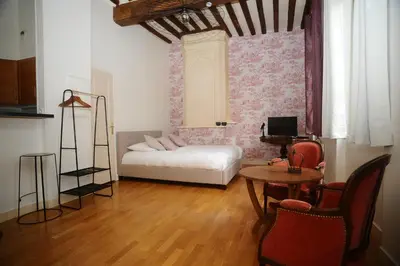 Un ou plusieurs lits dans un hébergement de l'établissement La Chambre d'Emma