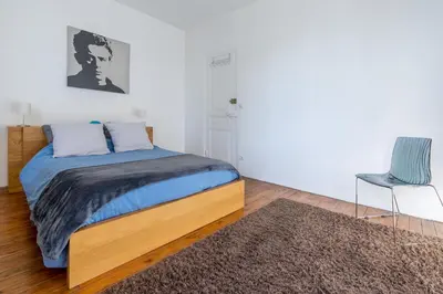 Un ou plusieurs lits dans un hébergement de l'établissement Maison Famille-Confort-Terrasse Jardin-Vue Cathédrale