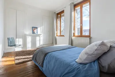 Un ou plusieurs lits dans un hébergement de l'établissement Maison Famille-Confort-Terrasse Jardin-Vue Cathédrale
