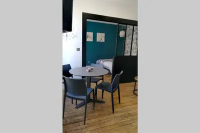 Coin salon dans l'établissement L'oasis : Appartement en centre ville