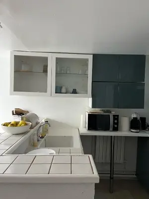 Cuisine ou kitchenette dans l'établissement La petite campagne