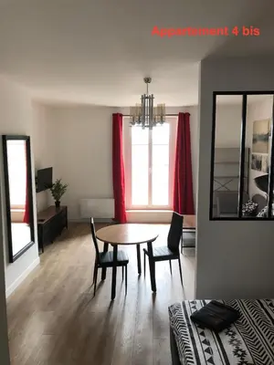 Coin salon dans l'établissement Les appartements du quai