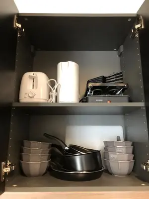 Cuisine ou kitchenette dans l'établissement Les appartements du quai