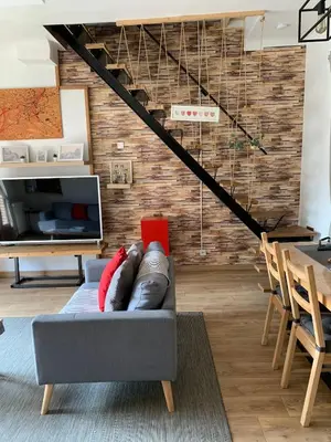 Coin salon dans l'établissement Jojo House Les Damps n 12