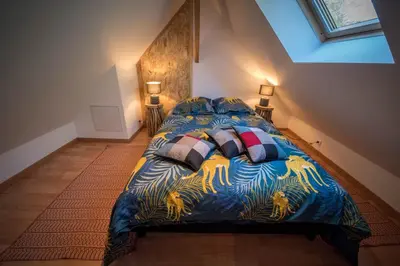 Un ou plusieurs lits dans un hébergement de l'établissement GITES du BOIS des PERRUCHES