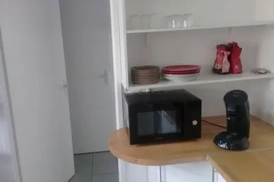 Cuisine ou kitchenette dans l'établissement Hortillonne