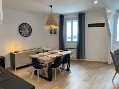 Coin salon dans l'établissement Family Appart 2