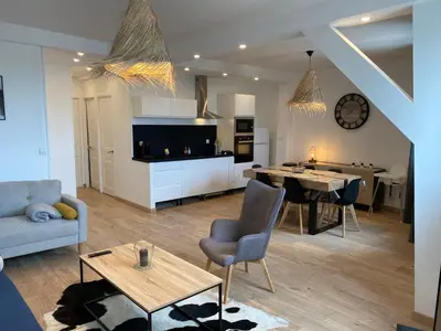 Coin salon dans l'établissement Family Appart 2