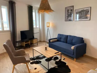 Coin salon dans l'établissement Family Appart 2
