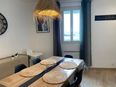 Coin salon dans l'établissement Family Appart 2