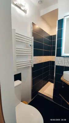 Salle de bains dans l'établissement La nouvelle p'tite Chouette Illuminée 2025