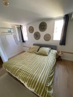 Un ou plusieurs lits dans un hébergement de l'établissement duplex proche gare vue tour Perret avec parking gratuit