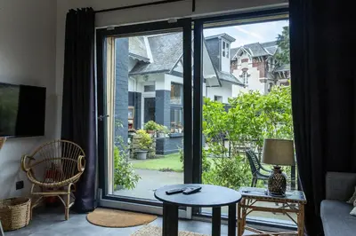 Jardin de l'établissement Appartement Beau Séjour - Accès Piscine