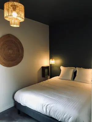 Un ou plusieurs lits dans un hébergement de l'établissement Appartement Beau Séjour - Accès Piscine