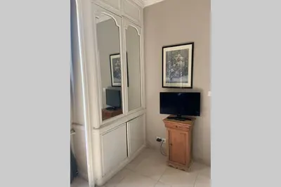 Télévision ou salle de divertissement dans l'établissement Le Clos de l'Eglise - Blanche