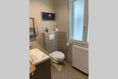 Salle de bains dans l'établissement Le Clos de l'Eglise - Blanche