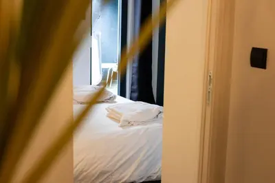 Un ou plusieurs lits dans un hébergement de l'établissement Appartement Bel Air - Piscine - jacuzzi