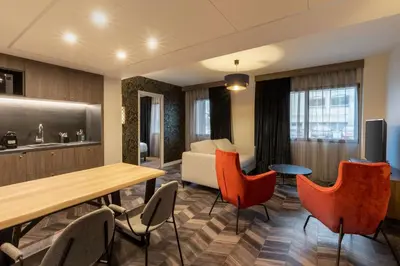 Coin salon dans l'établissement Best Western Plus Le Conquerant Rouen Nord