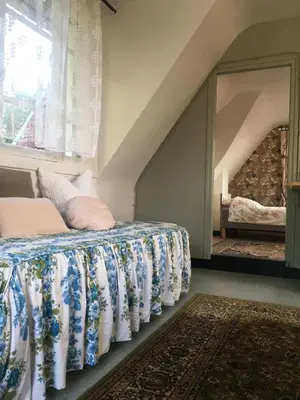 Un ou plusieurs lits dans un hébergement de l'établissement Maison BelleMondo
