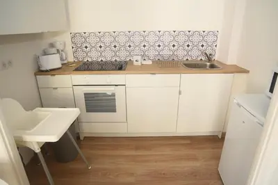 Cuisine ou kitchenette dans l'établissement LOU La Chaloupe