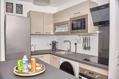 Cuisine ou kitchenette dans l'établissement La vallée des Hortillonages