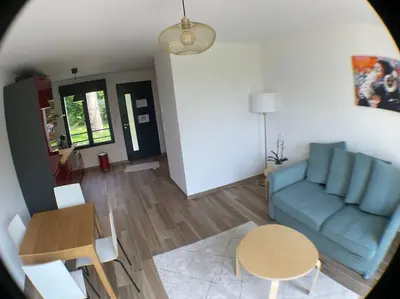 Coin salon dans l'établissement Superbe appartement avec vue sur la tour Eiffel