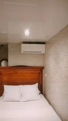 Un ou plusieurs lits dans un hébergement de l'établissement Chambre meublée indépendante, jacuzzi dans la chambre à 60110 Amblainville près de Paris