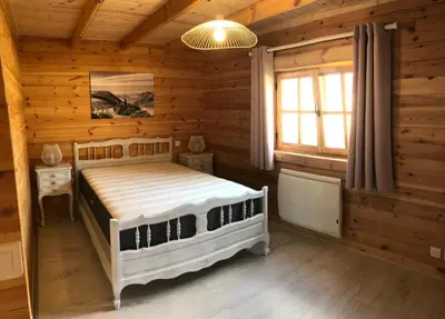Un ou plusieurs lits dans un hébergement de l'établissement Le Chalet Caux-Marin