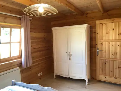 Un ou plusieurs lits dans un hébergement de l'établissement Le Chalet Caux-Marin