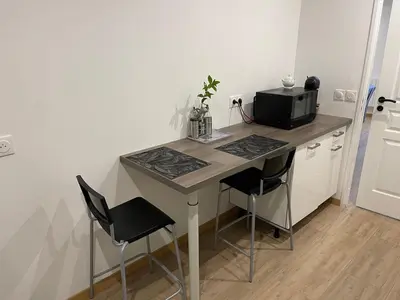 Cuisine ou kitchenette dans l'établissement Vitospa