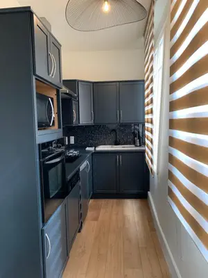 Cuisine ou kitchenette dans l'établissement La Suite Royale