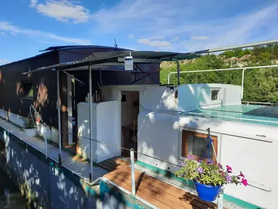 Balcon ou terrasse dans l'établissement APPART sur l'EAU SPA Proche PARIS