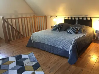 Un ou plusieurs lits dans un hébergement de l'établissement location de chambre en petit duplex proche de la baie de Somme