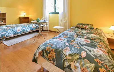 Un ou plusieurs lits dans un hébergement de l'établissement Lovely Apartment In Le Mesnil-Esnard
