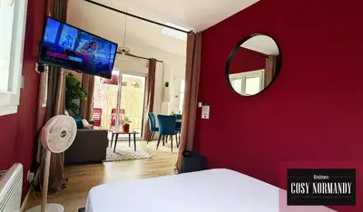 Un ou plusieurs lits dans un hébergement de l'établissement Cosy Normandy - 01