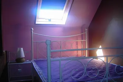 Un ou plusieurs lits dans un hébergement de l'établissement Maison Le four à chaux