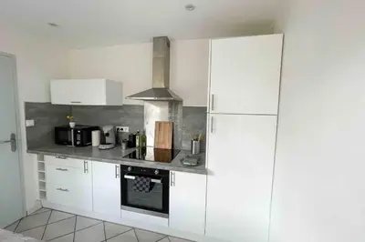 Cuisine ou kitchenette dans l'établissement SPA - 4 Pers - NETFLIX - Gare - Parking