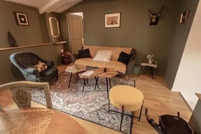 Coin salon dans l'établissement Bel Appartement, parking selon dispo