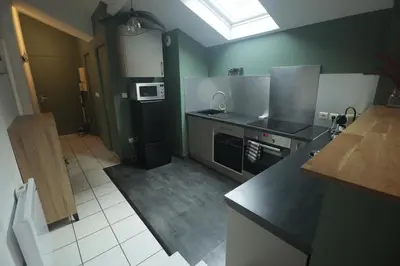 Cuisine ou kitchenette dans l'établissement Bel Appartement, parking selon dispo