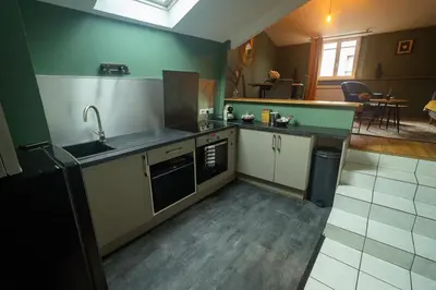 Cuisine ou kitchenette dans l'établissement Bel Appartement, parking selon dispo