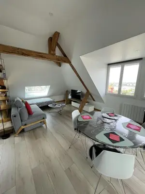 Coin salon dans l'établissement Le Loft de Flore