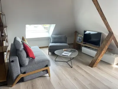 Coin salon dans l'établissement Le Loft de Flore