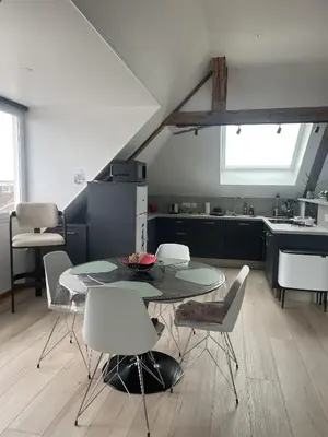 Coin salon dans l'établissement Le Loft de Flore