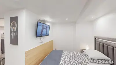 Un ou plusieurs lits dans un hébergement de l'établissement Kimia House appartement spacieux