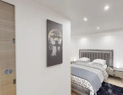 Un ou plusieurs lits dans un hébergement de l'établissement Kimia House appartement spacieux