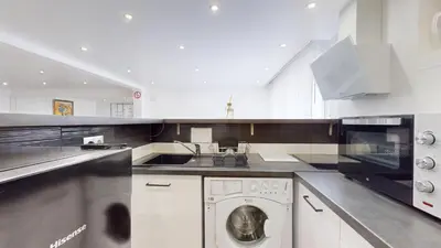 Cuisine ou kitchenette dans l'établissement Kimia House appartement spacieux
