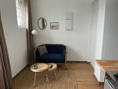 Coin salon dans l'établissement Appartement 2 personnes : LES CANAUX