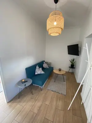 Télévision ou salle de divertissement dans l'établissement Appartement Rez de chaussé